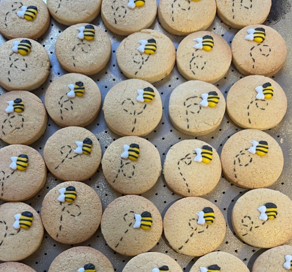 Bee-themed biscuits made generously by Briony May Williams.