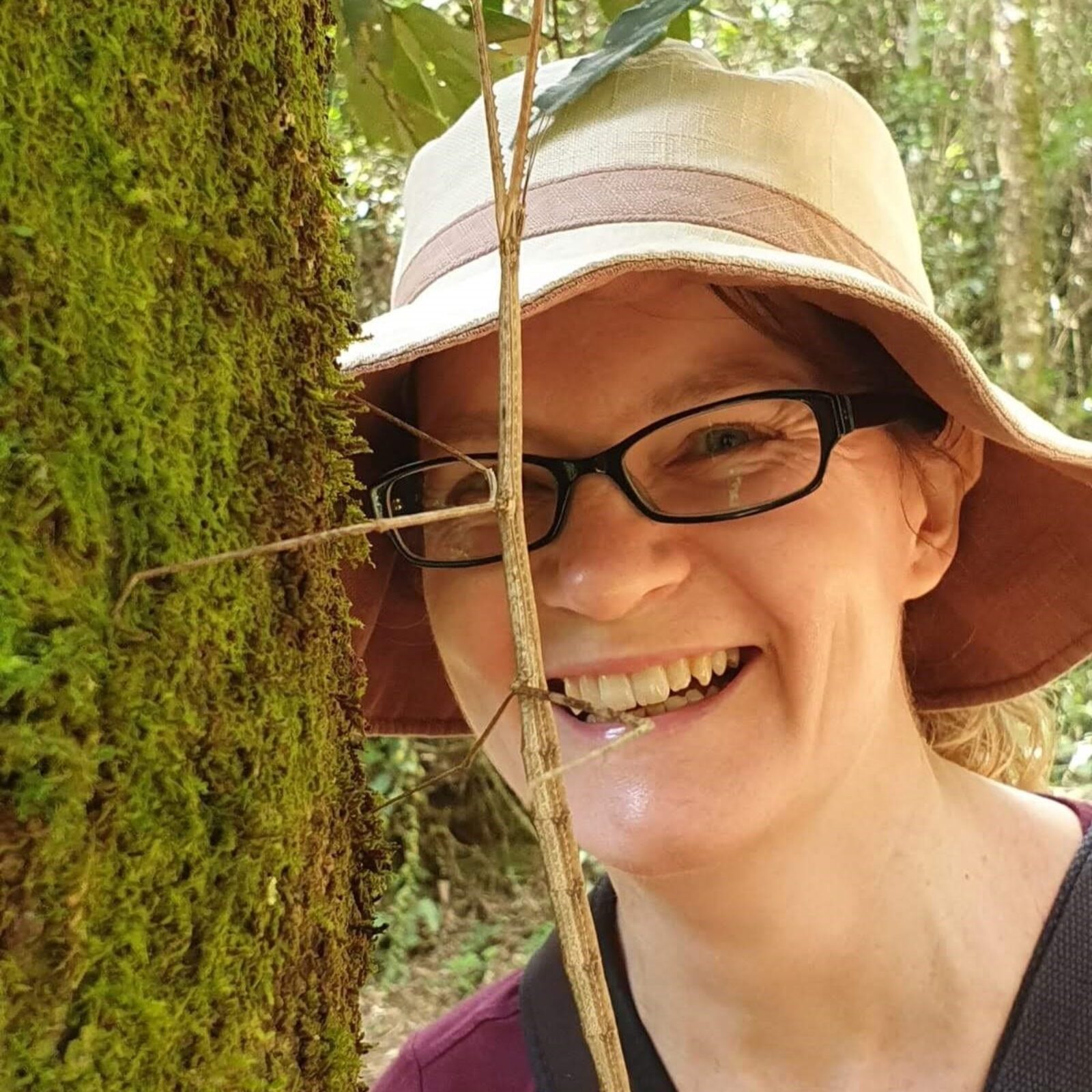 Sheena Cotter, Editor-in-Chief of RES journal Ecological Entomology holding a stick insect