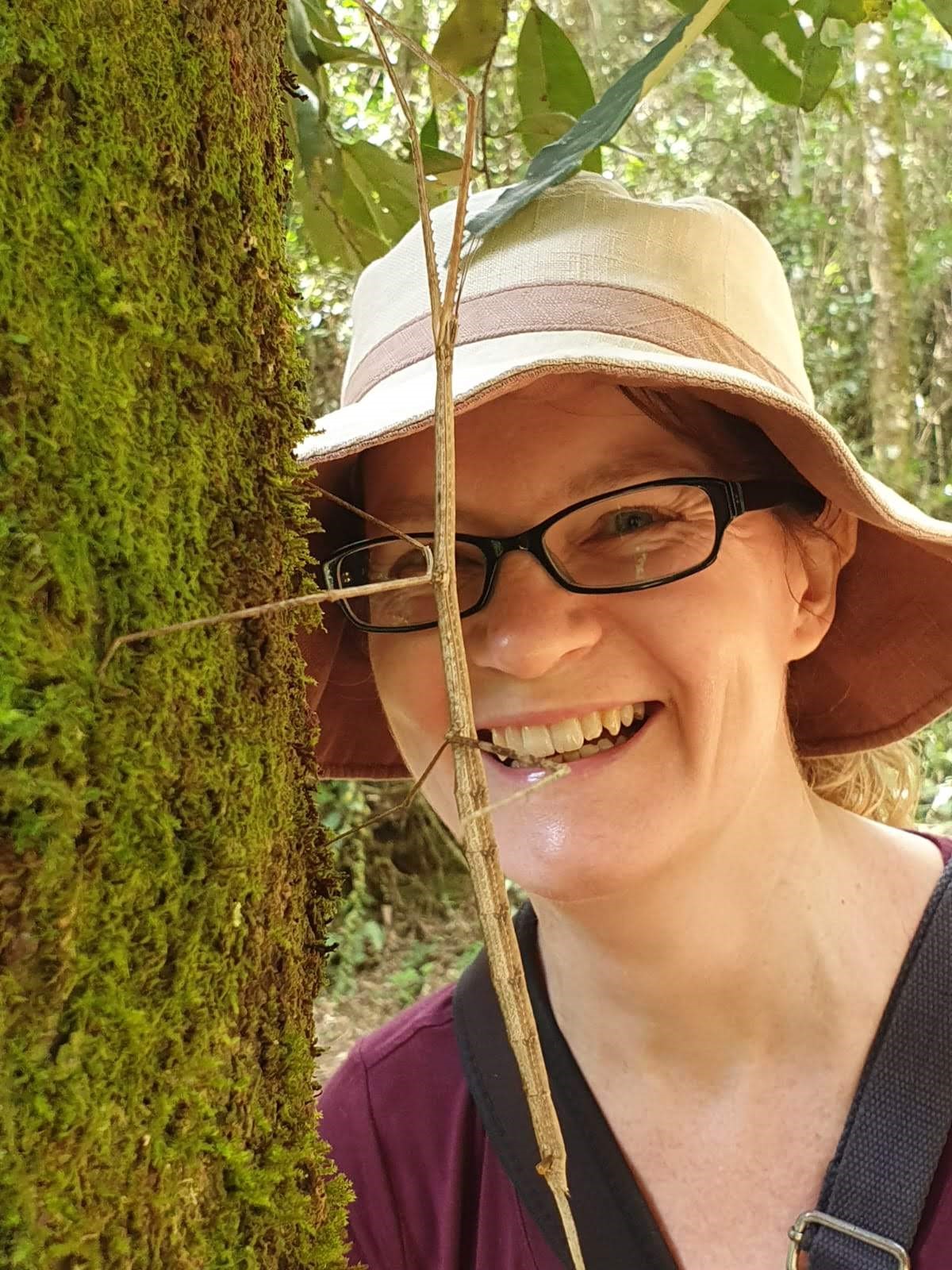 Sheena Cotter, Editor-in-Chief of RES journal Ecological Entomology holding a stick insect